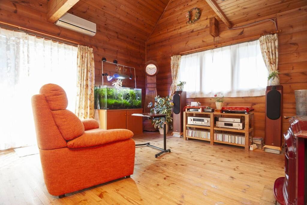 Log House Tomi-chan's House / Private Building Ferienhaus