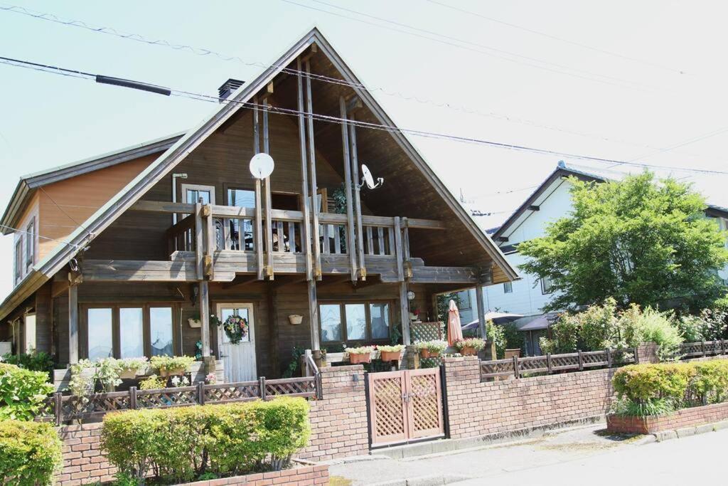 Log House Tomi-chan's House / Private Building Ferienhaus